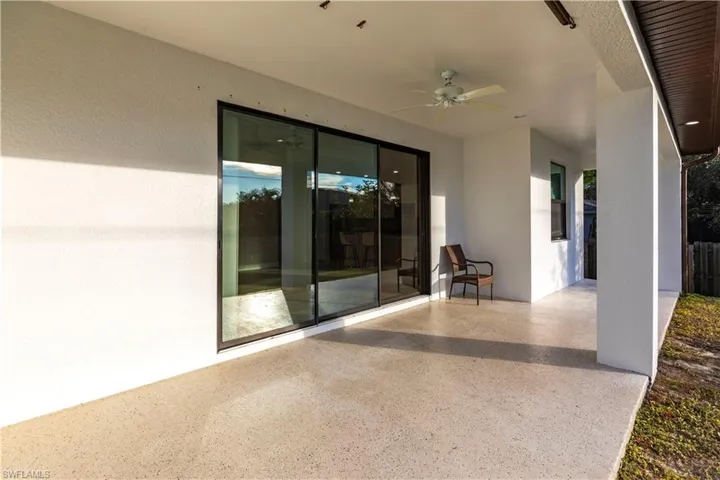 View of patio with ceiling fan