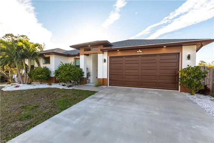 View of front of home with a garage