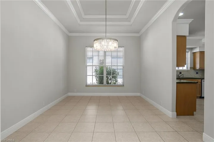 Dining room without staged furnishings. Large size for your entertaining options.