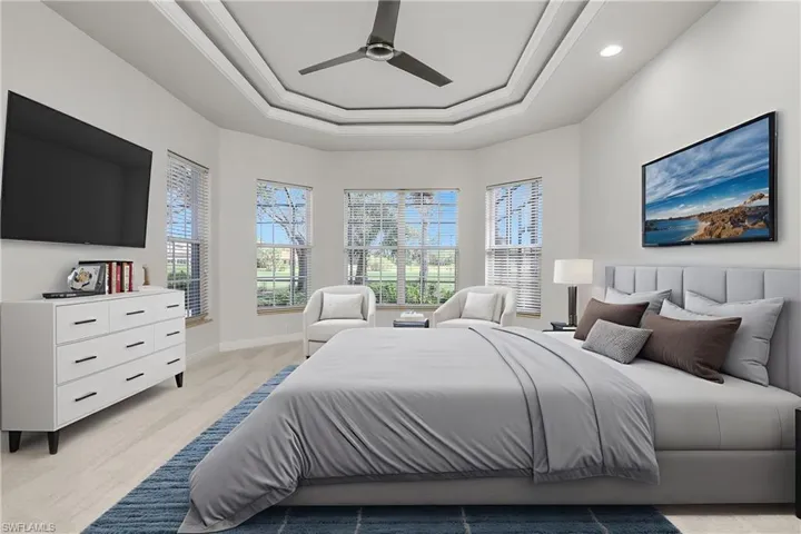 Master Bedroom with staged furniture...new carpet, lighting, fan installed September 2025. King size bed.