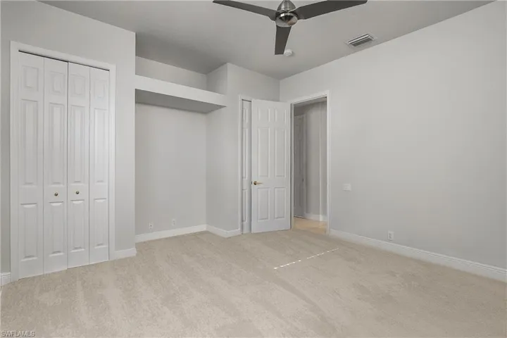Second guest bedroom, new carpet and fan installed September 2025