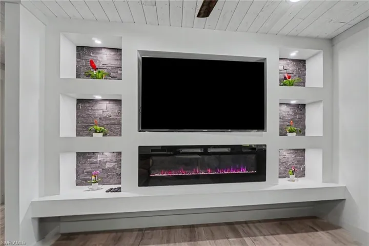 Main House - Custom Entertainment center with electric fireplace and LED lighting