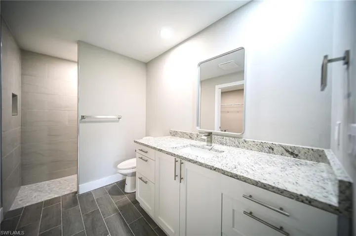 The Master Bathroom Has Granite Countertops, Custom Soft Close Cabinets & Drawers, Custom Walk-In Tiled Shower, And Brushed Nickle Fixtures!