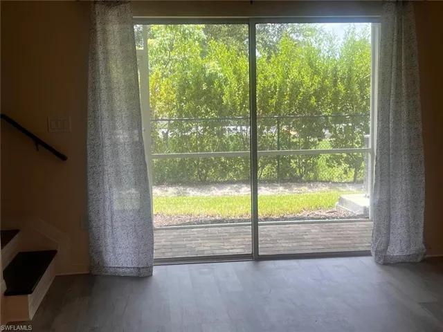 Unfurnished living room with wood-type flooring