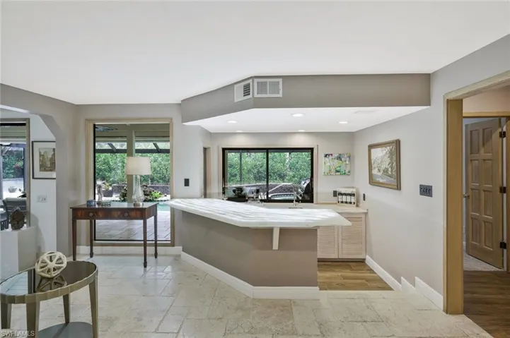 Bar area adjacent to pool and great room