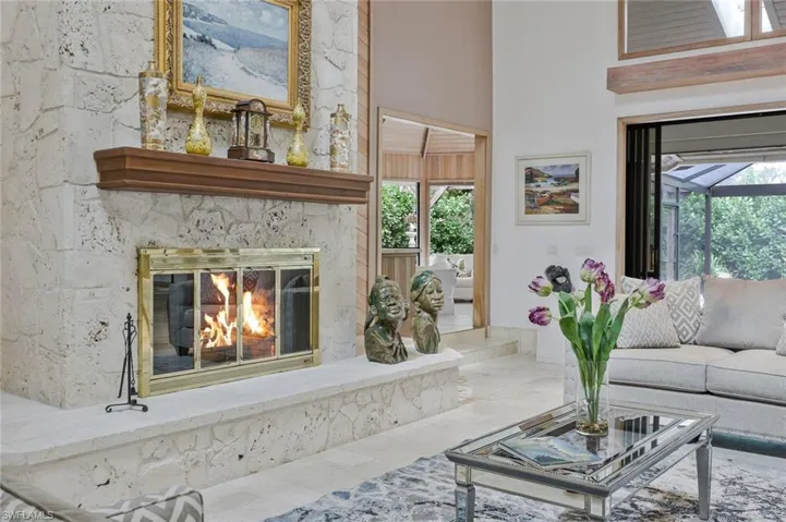 Living area open to the pool and garden