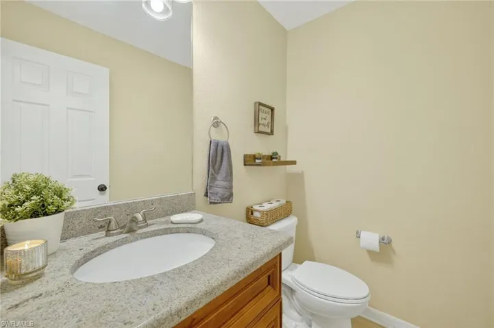 Bathroom with toilet and vanity
