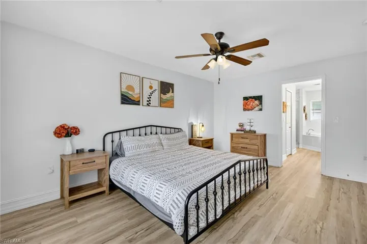 Bedroom featuring light wood-style flooring and ceiling fan