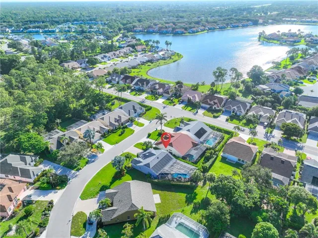 Aerial view of residential area with a large body of water