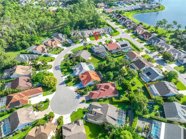 Aerial view of residential area with a large body of water