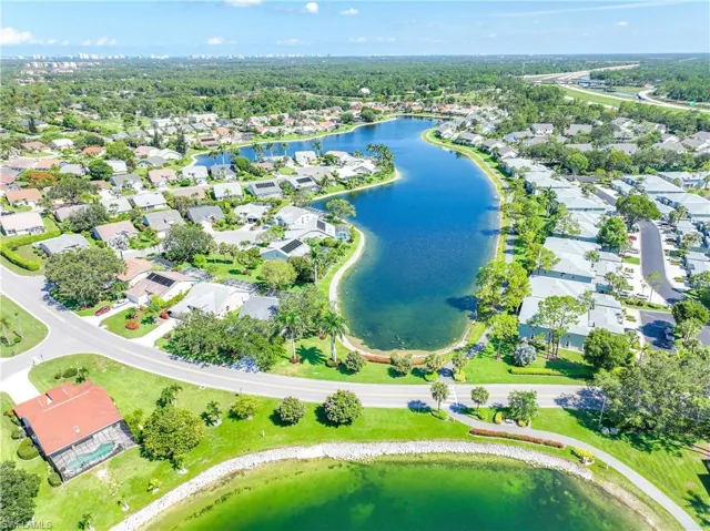 Aerial overview of property's location featuring nearby suburban area