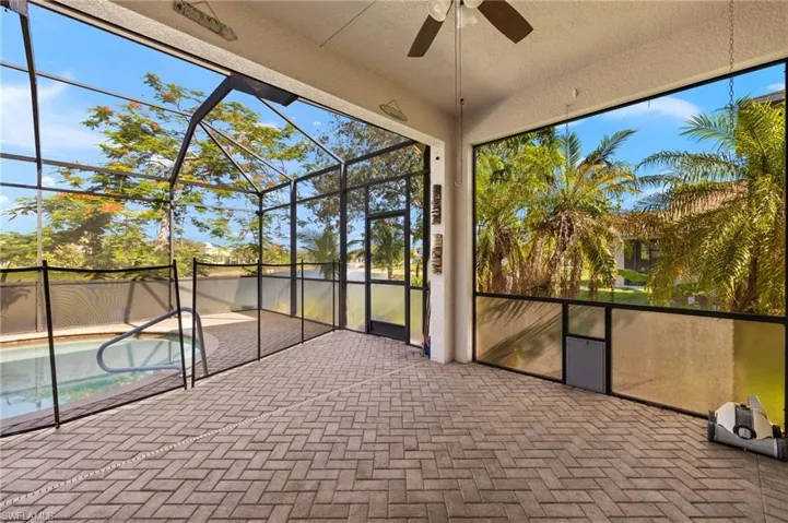 sunroom with a ceiling fan