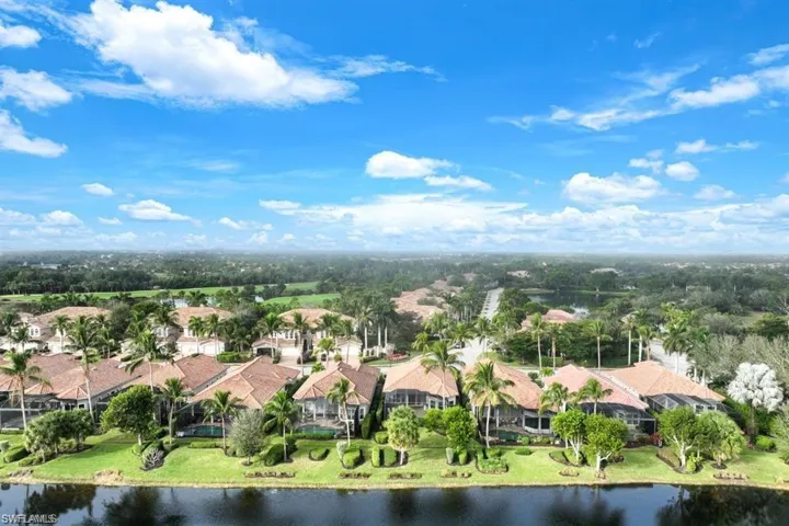 View of property location with a large body of water and nearby suburban area