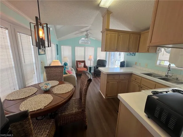 Dinette and Kitchen with Wood Cabinetry