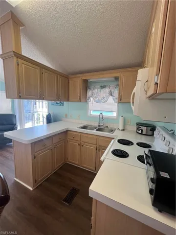 Kitchen with Wood Cabinetry