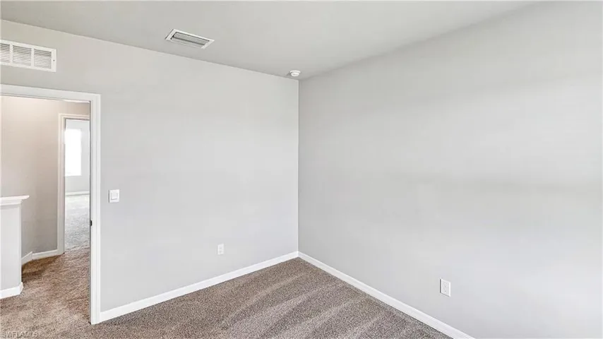 Spare room with carpet