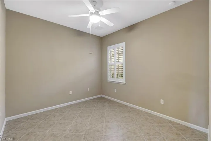Unfurnished room with ceiling fan