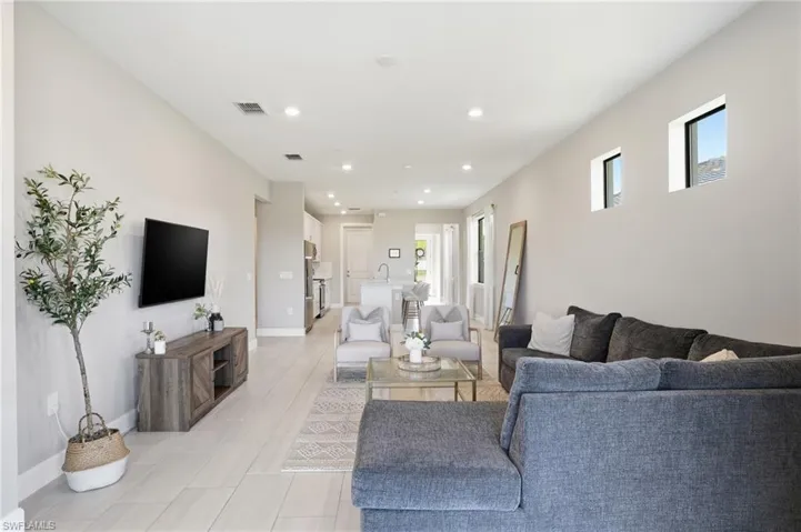 Main living area off kitchen.