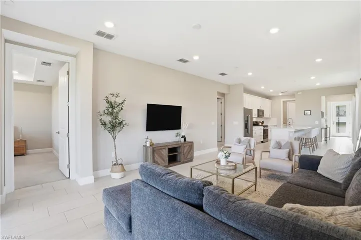 Main living area off kitchen.