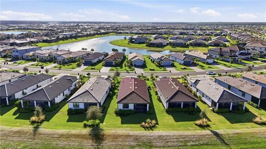 Aerial view of property neighborhood.
