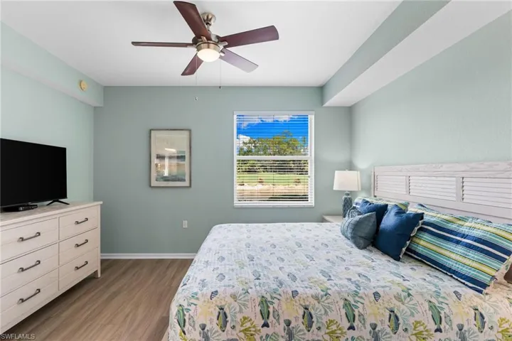 Bedroom featuring light wood-style floors and a ceiling fan