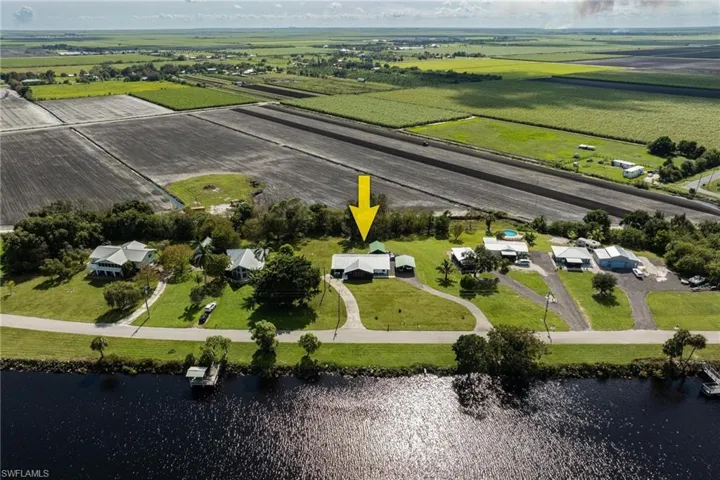 Aerial view featuring The Caloosahatchee River and a rural view. This is the Setting for Tranquility!