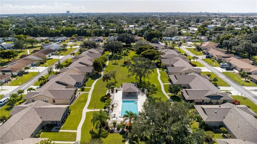 Aerial view of residential area with a pool