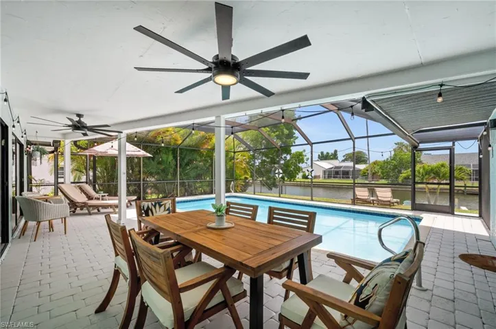Large covered lanai next to the pool