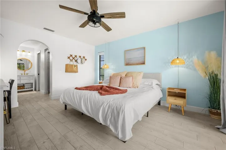 Primary bedroom with walk in closet and it's own bath