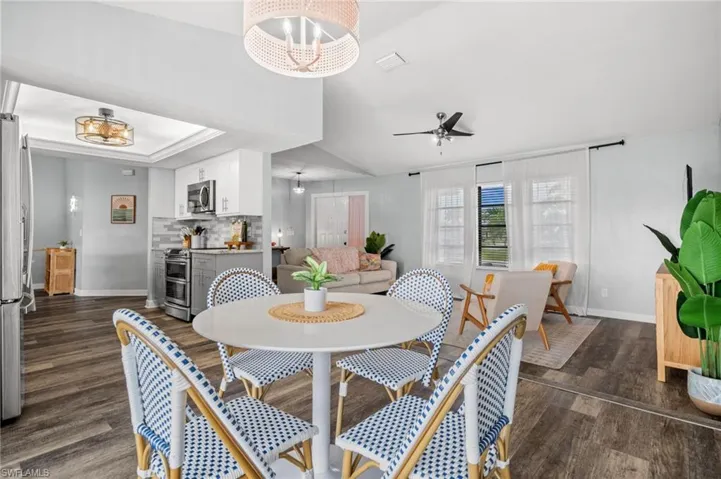Open dining next to the kitchen
