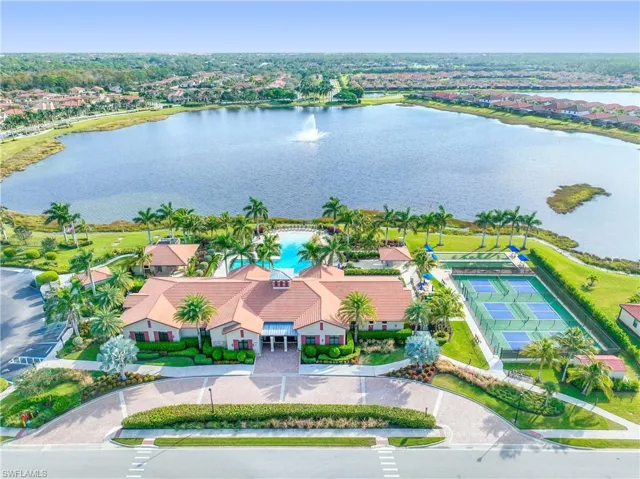 Aerial perspective of clubhouse area featuring a large body of water