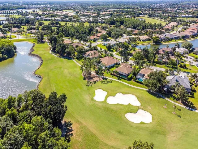 Bird's eye view featuring golf course view, a residential view, and a water view