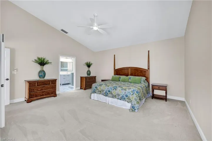 Spacious primary bedroom with en suite bathroom.