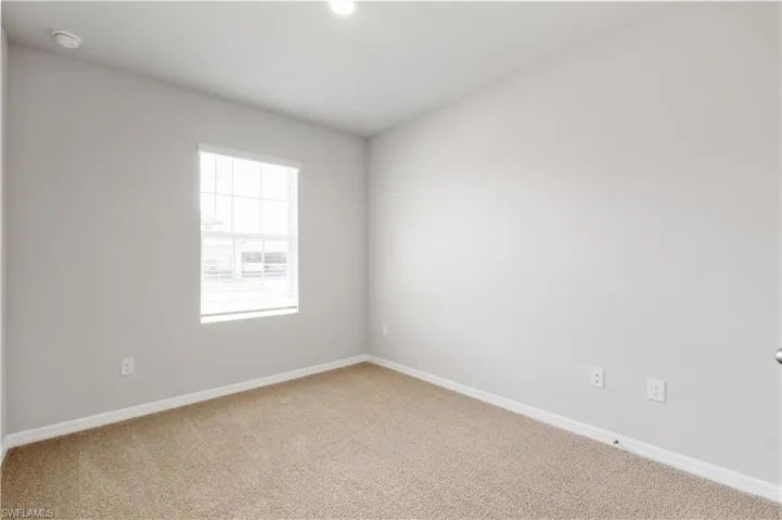 Empty room featuring carpet
