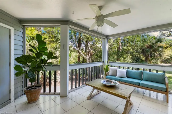 Sunroom with tile patterned flooring