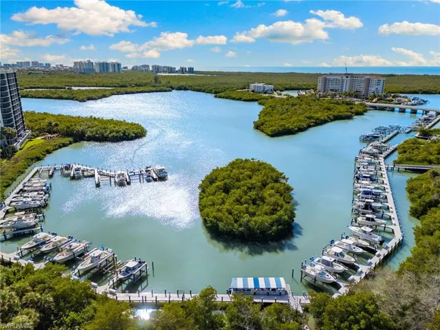 View of urban area with a marina and a large body of water