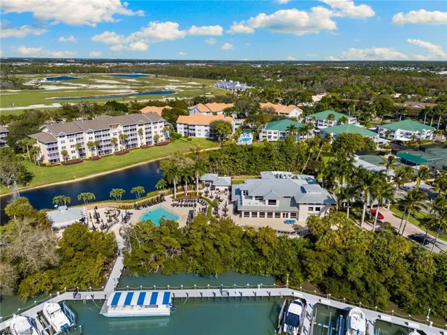 Aerial view of a large body of water and apartment complex