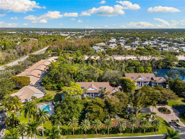 Aerial overview of property's location with nearby suburban area