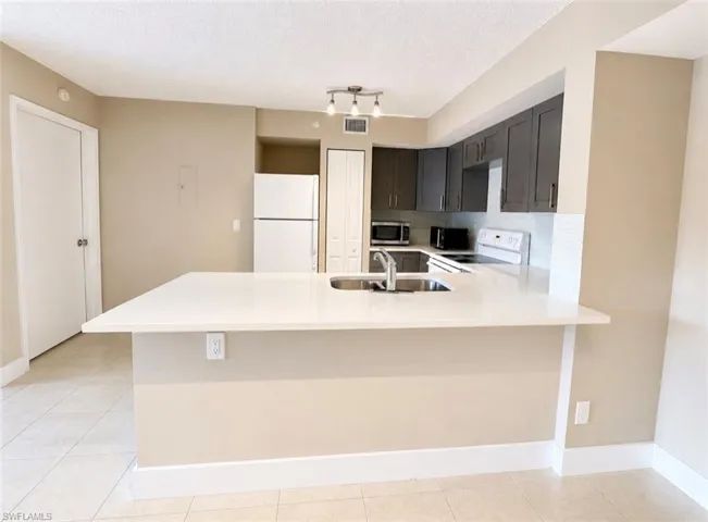 1205 Wildwood Lakes Blvd 203, Naples, Florida 34104