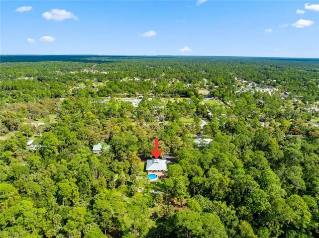Drone / aerial view of a heavily wooded area