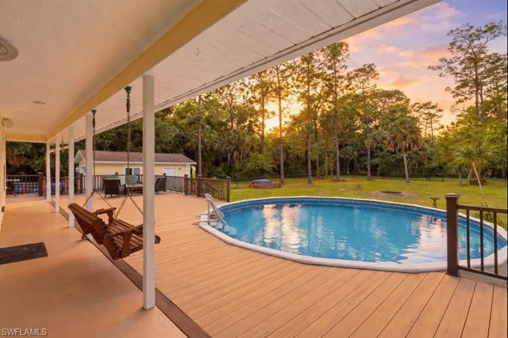 View of pool with a deck and a patio area
