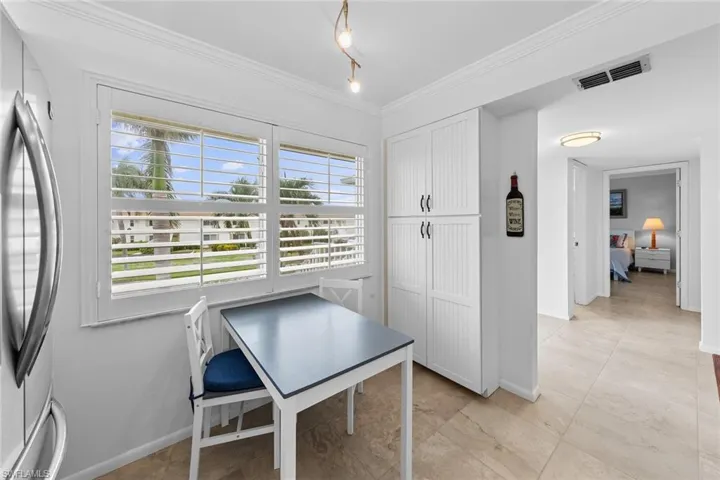 Unfurnished office featuring ornamental molding
