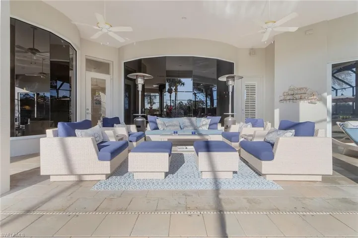View of patio / terrace with an outdoor living space and ceiling fan
