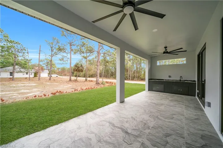 View of patio / terrace with a ceiling fan