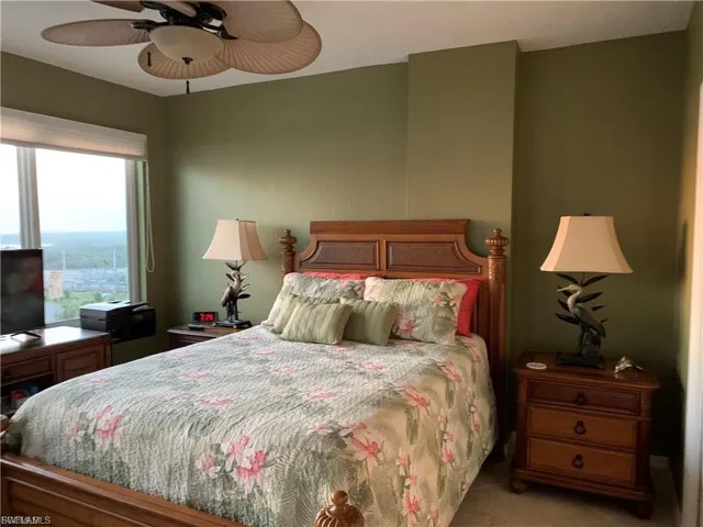 Bedroom featuring ceiling fan and light tile patterned floors