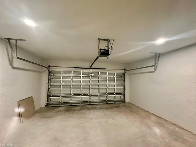 Two car Garage with a garage door opener