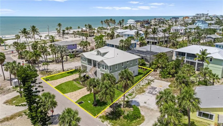 Let's Walk to the Beach! -Birds eye view of property featuring a water view - VIRTUAL EDITED EXTERIOR IMAGE