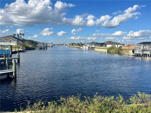 Water view with a boat dock