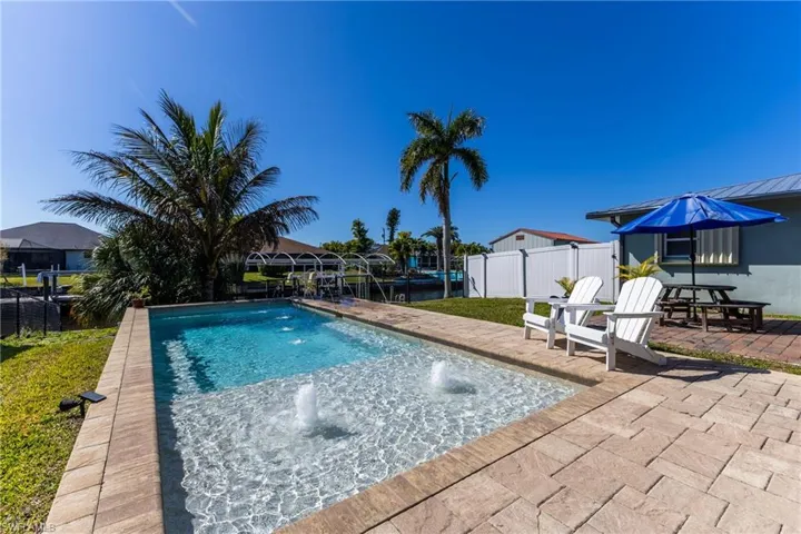 View of pool featuring patio surround