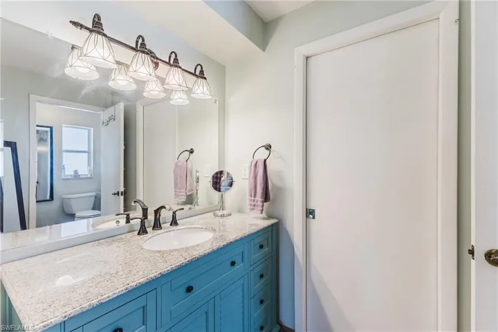 Bathroom with toilet and vanity